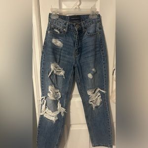I’m selling these blue ripped mom jeans